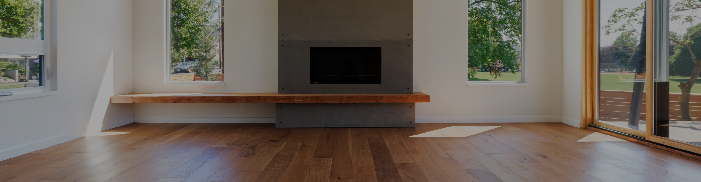 wood-look floors with a custom fireplace